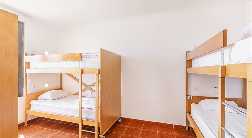 Bed in a 6-bed male dorm