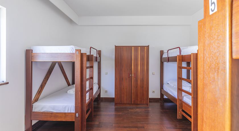 Bed in a 6-bed male dorm