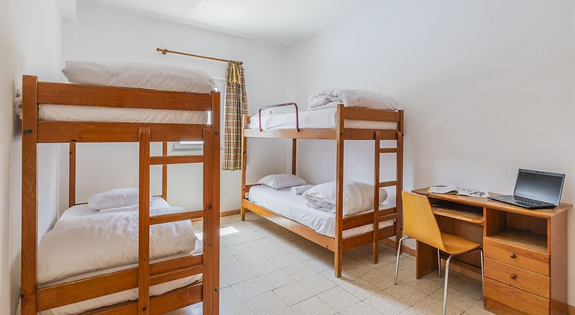 Bed in a 4-bed male dormitory