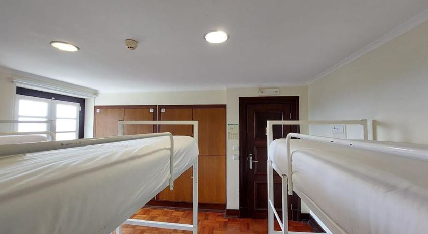 Bed in a 6-bed male dorm