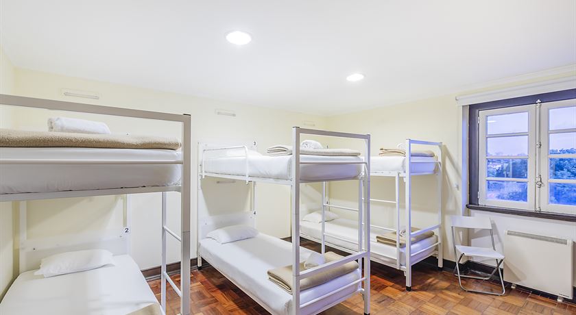 Bed in a 6-bed male dorm