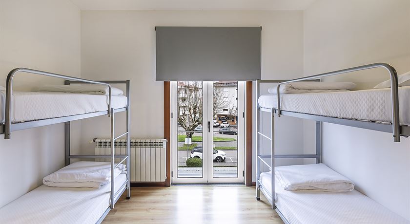Bed in a 4-bed male dorm