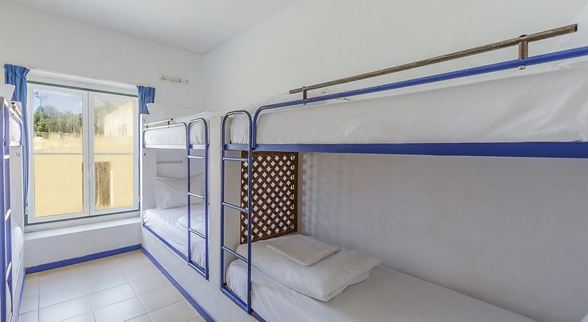 Bed in a 6-bed male dorm