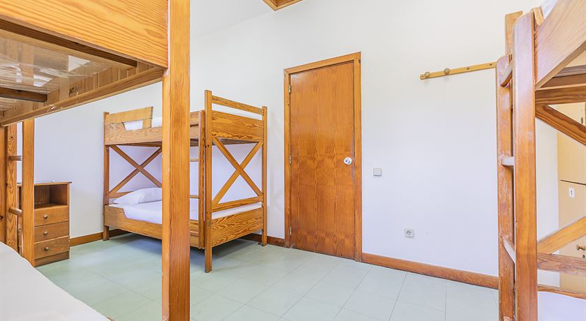 Bed in a 6-bed male dorm