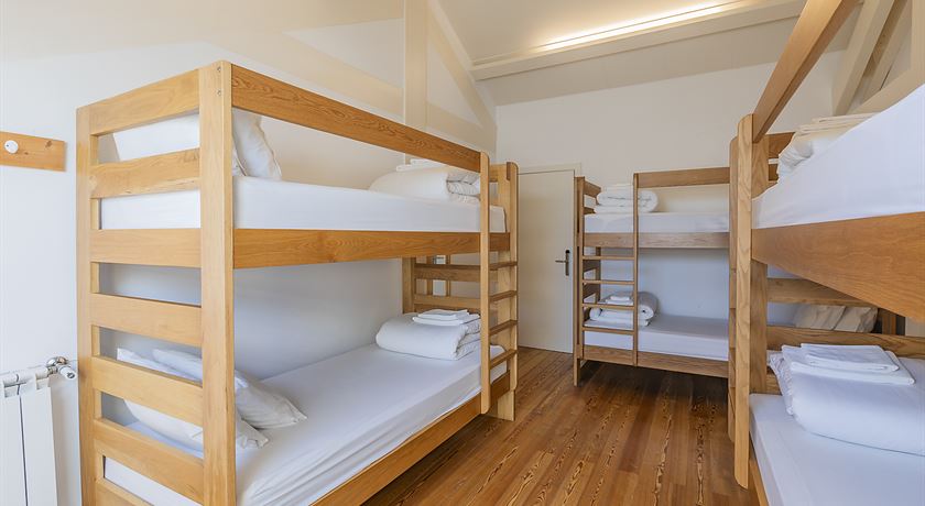 Bed in a 6-bed male dorm